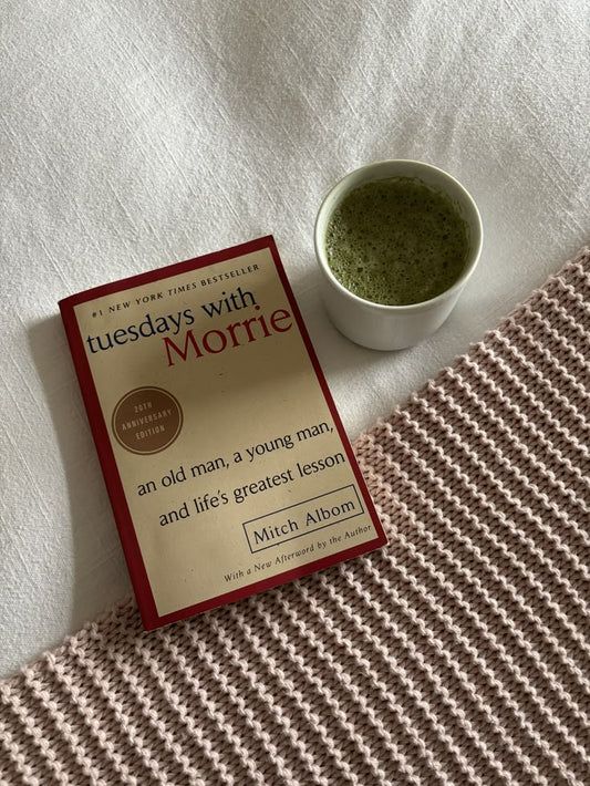 Tuesdays with Morrie: An Old Man, a Young Man, and Life's Greatest Lesson, Premium Paperback – October 8, 2002